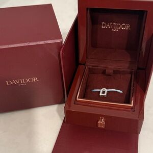 L’Arc voyage charm PM 18k white gold with galerie diamonds on silk cord bracelet